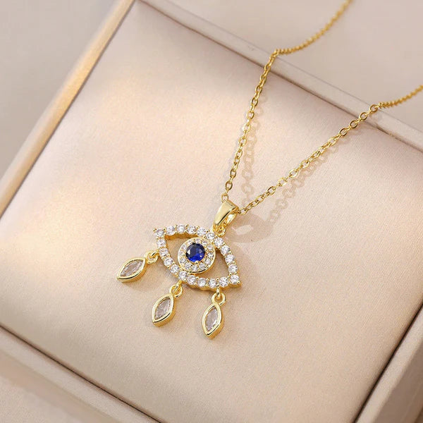 Luxn Gold Plated American Diamond Studded Evil Eye Themed Pendant