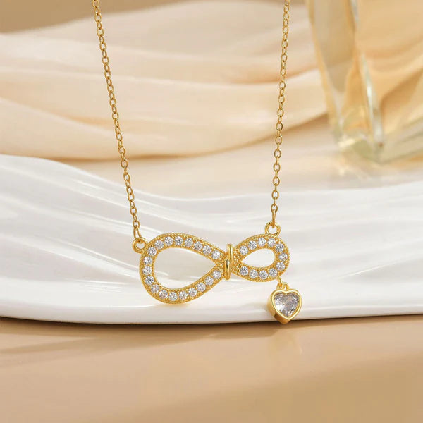 Luxn Gold Plated American Diamond Studded Infinity Themed Pendant