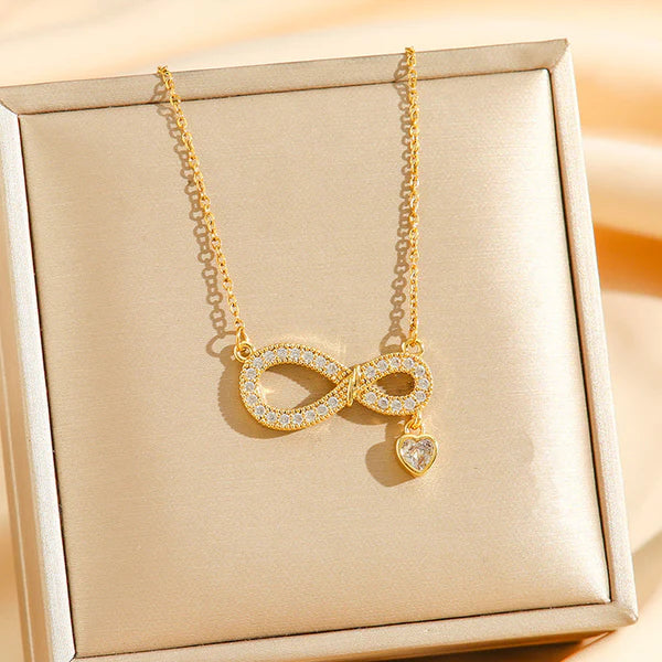 Luxn Gold Plated American Diamond Studded Infinity Themed Pendant
