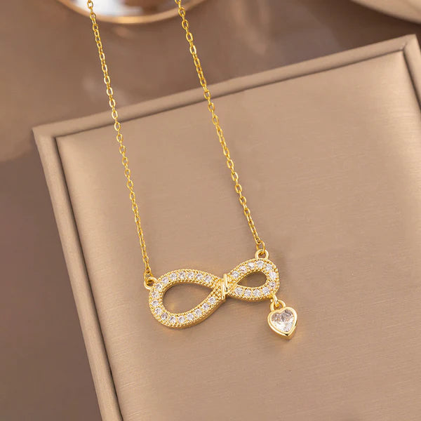 Luxn Gold Plated American Diamond Studded Infinity Themed Pendant