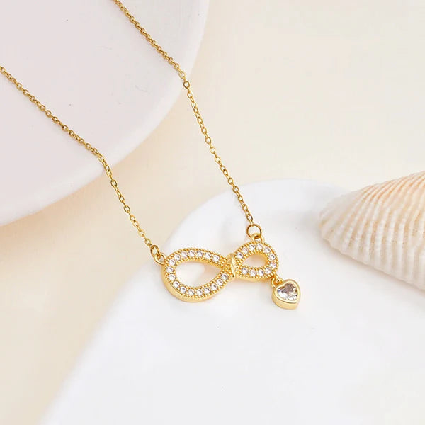 Luxn Gold Plated American Diamond Studded Infinity Themed Pendant